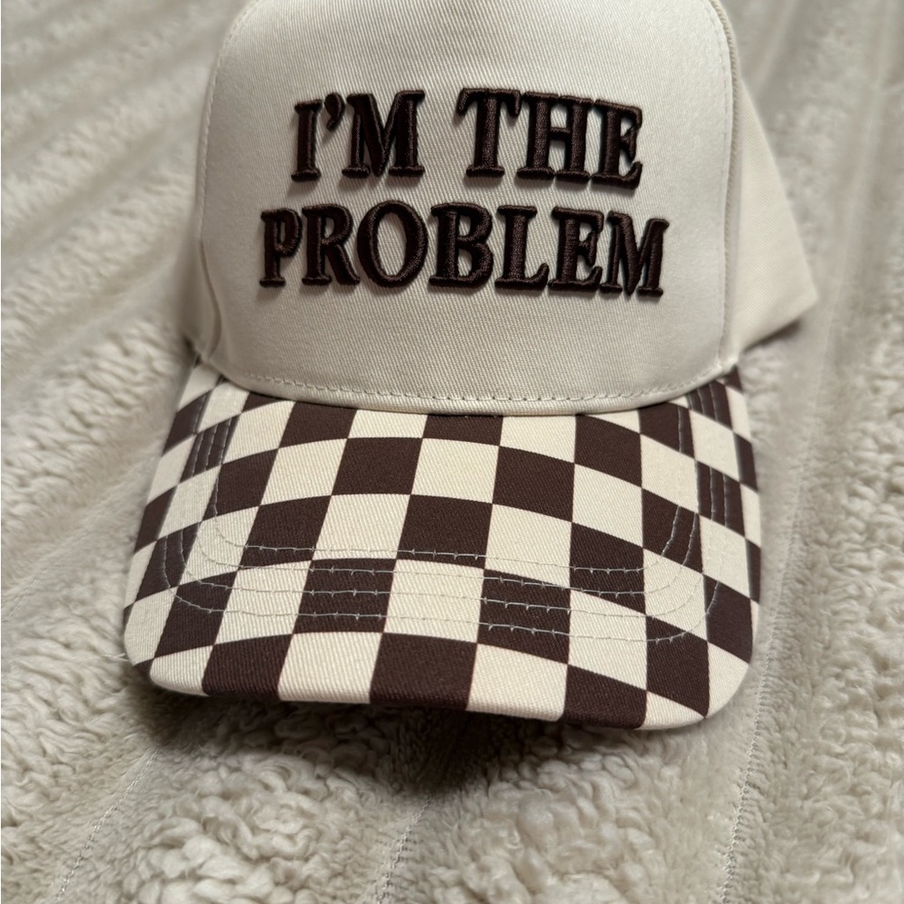 Buckle Beige and Brown "I'm The Problem" Checkerboard Trucker Hat